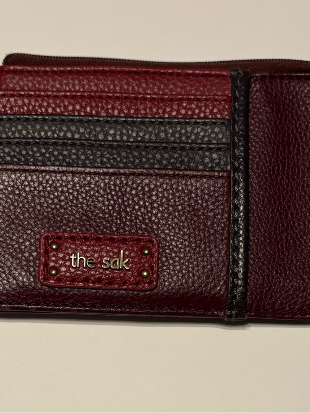 The Sak Women’s Leather Wallet in Burgundy and Navy